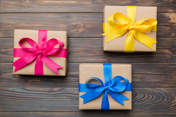 Collection of Holiday present boxes on a colored background. top view close up