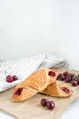 Croissants with cherries