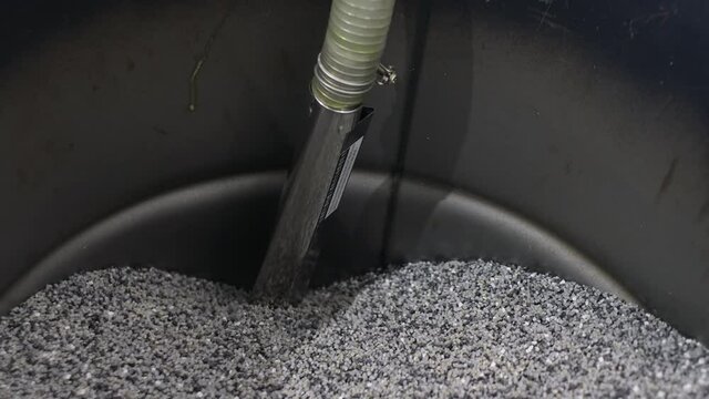 Barrel with polypropylene granules in the technological process. PP Pet Chips Semi Dull, PET chips recycle, PET polyester chips