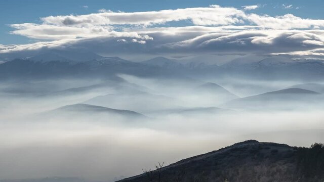 Timelapse from Vodno mountain, near Skopje above clouds, zoom out