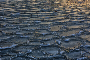 freezing sea ice round pieces, ocean background winter climate coast