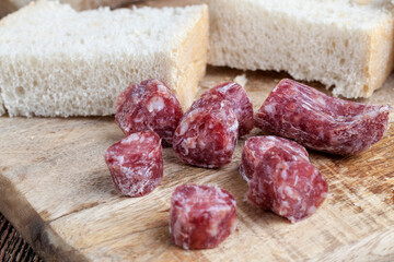 sliced sausage of dried meat with bacon