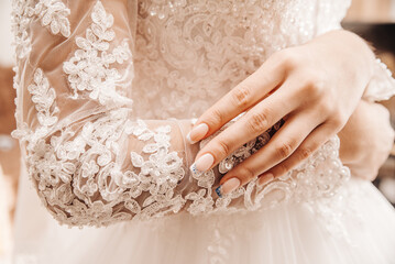 Hand with beautiful nails on lace background 