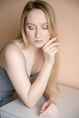 Portrait of a beautiful young woman with blue eyes.