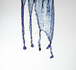 Blue water splash on white background