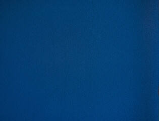 Blue wall. A closed up texture of blue wall with plaster pattern and background.