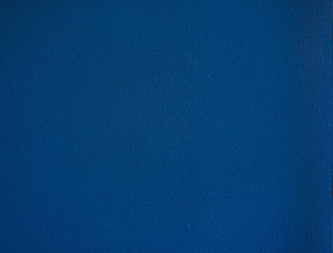 Blue wall. A closed up texture of blue wall with plaster pattern and background.