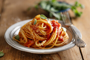 Pasta with spaghetti sauce and cheese