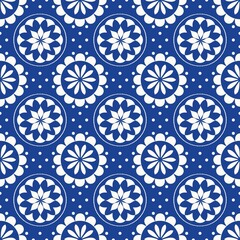 Blue white seamless background with flowers..Abstract, repeating regular pattern for print..Graphic design with regular shapes.