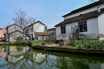 Naklejka na ściany i meble Farmers' riverside houses in rural China