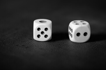 two dice on black