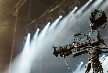 Professional broadcast digital video camera on stage.