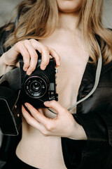 Beautiful girl with Vintage Photo Camera 