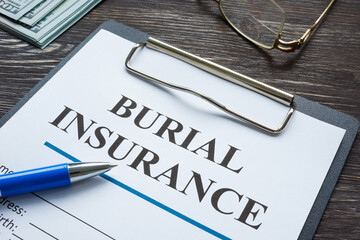 A Burial insurance empty application and pen. - obrazy, fototapety, plakaty