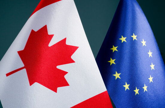 Close up of flags of Canada and EU Europe Union.