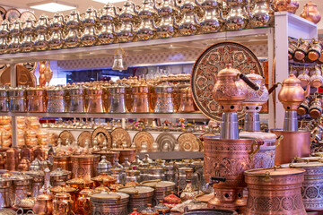 Turkish delight cups, pots, tea kettles and souvenirs are made of copper. Turkish delight cups and kettles in Coppersmith Bazaar in Erzincan, Turkey.