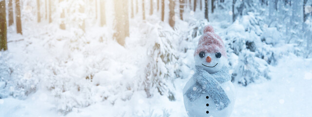 Winter snow snowman background panoramic banner panorama - Little cute Snowman sits on snow in snowy forest with snowflakes and sunshine