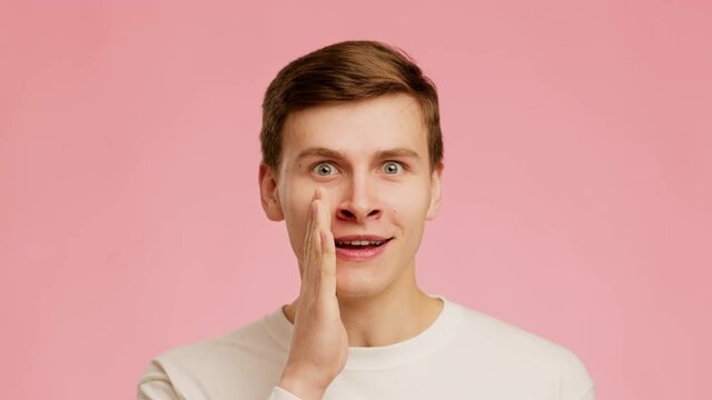 Guy Whispering Holding Hand Near Mouth Sharing Gossips, Pink Background