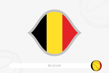 Fototapeta premium Belgium flag for basketball competition on gray basketball background.