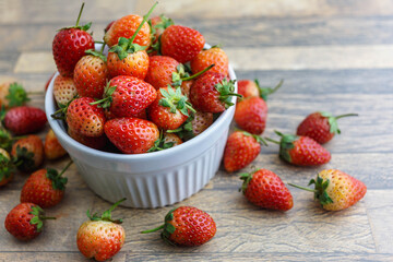 Strawberry is a sweet fruit on bowl
