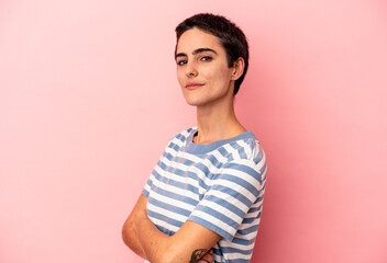 Obraz premium Young caucasian woman isolated on blue background happy, smiling and cheerful.
