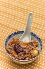 Bowl of chinese laba zhou porridge - obrazy, fototapety, plakaty