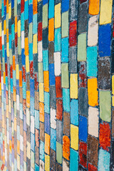 Vertical perspective view of abstract colorful square bricks wall decorate outdoor with creative background concept idea