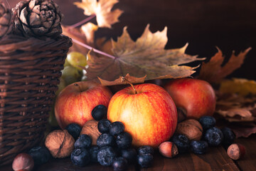 Naklejka na ściany i meble Still life of fruits and berries on a wooden table
