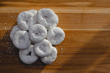 Overhead view of powdered donuts or doughnuts
