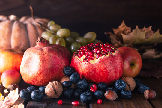 still life with fruits and berries. Opened grapefruits and blueberries