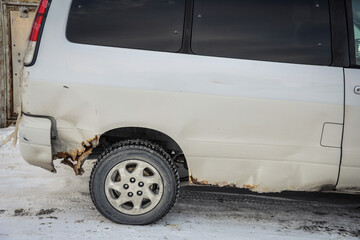 Rust on an old minivan close-up