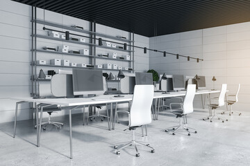 Modern concrete coworking office room interior with equipment, daylight and furniture. 3D Rendering.