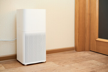 White air purifier in an apartment