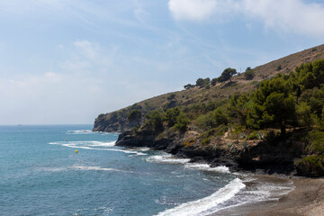 Fototapeta na wymiar lonely cove on the costa brava one summer day in the municipality of roses