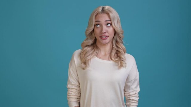 Frustrated lady look empty space not like isolated blue color background