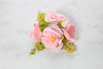 Festive flower composition on blue background. Overhead view