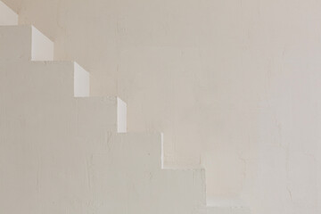 Minimalistic plain staircase along the wall. Light color indoor architecture element. Texture background for business posters. Growth concept.