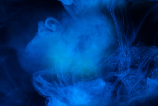 Blue Steam On A Black Background.