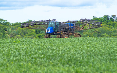 pesticide tractor working in fields