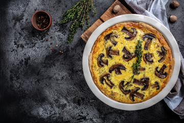 Traditional french pie Quiche Lorraine mushrooms champignons and cheese. Savory tart pie with...