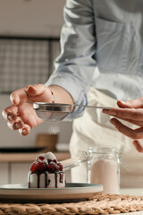 Soap cake, hands on the background of the kitchen