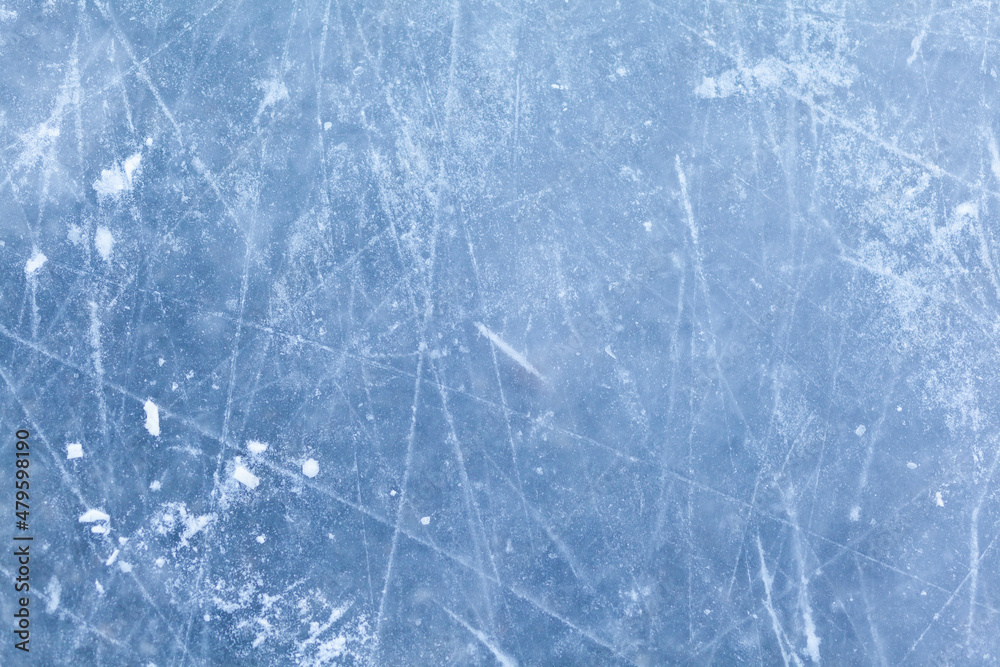 Aufkleber empty ice rink with skate marks after the session outdoor. skating ice rink texture covered with sno