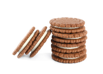 Tasty chocolate sandwich cookies with cream on white background