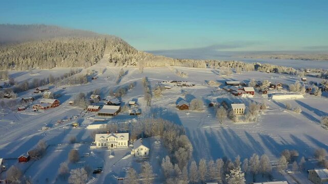 Aerial view of a village in northern Sweden in cold winter weather