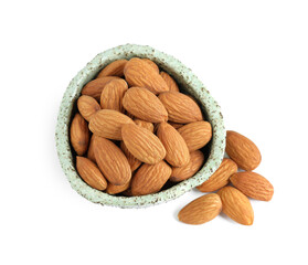 Bowl and organic almond nuts on white background, top view. Healthy snack