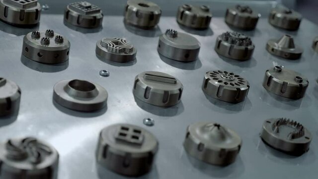 Nozzle body is made of aluminum alloy or stainless steel, some forming elements and  injectors are made of brass and they are intended for industrial confectionery equipment in production of flour 