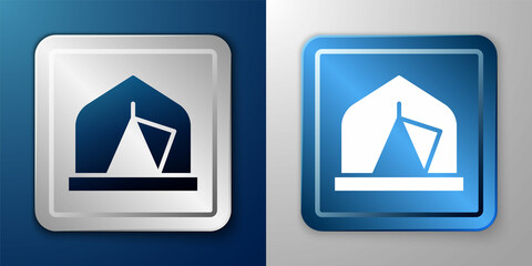 White Tourist tent icon isolated on blue and grey background. Camping symbol. Silver and blue square button. Vector