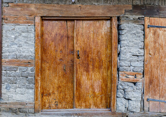 Vintage closed wooden doors in the village