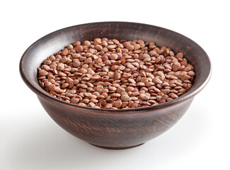Uncooked lentils in ceramic bowl isolated on white background with clipping path
