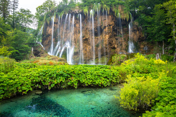 Large panorama of waterfalls in Plitvice Lakes National Park, Croatia, Europe. Majestic view with turquoise water of the lake and waterfalls, tourist attractions © Gunter